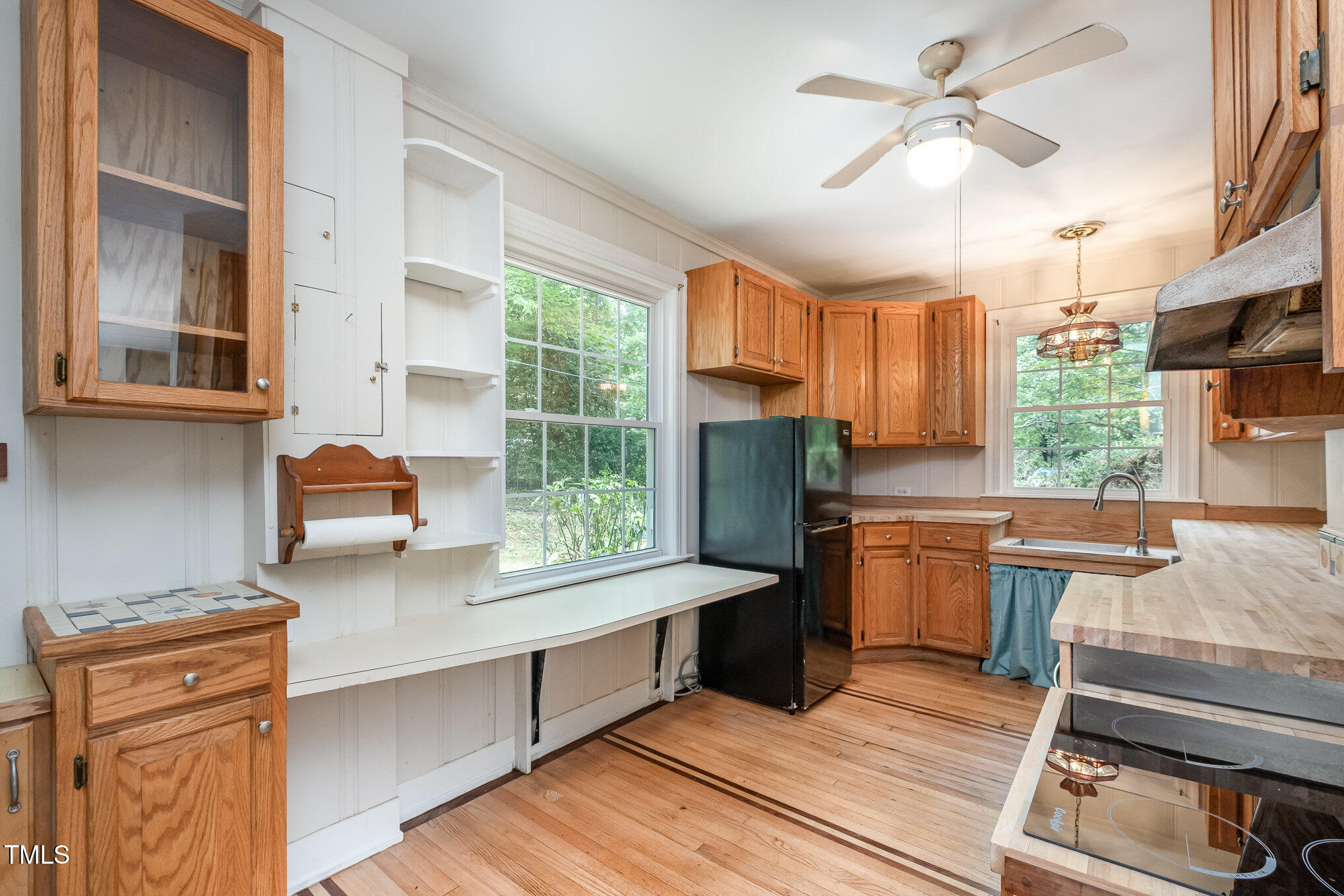 420 Lipscomb Grove Church Road Hillsborough, NC 27278 - Photo 6 of 27 a kitchen with stainless steel appliances granite countertop a stove a sink dishwasher and a refrigerator with wooden floor