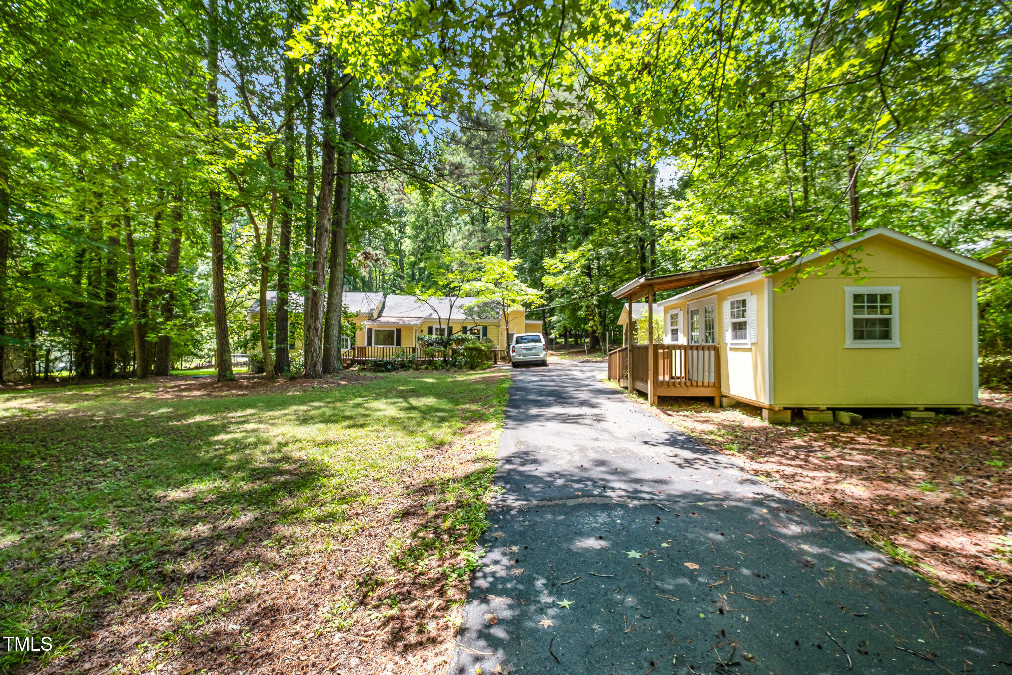 420 Lipscomb Grove Church Road Hillsborough, NC 27278 - Photo 8 of 27 a view of a house with a backyard