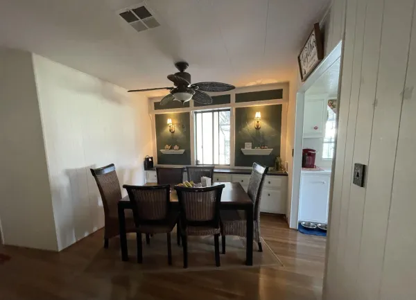 a view of a dining room with furniture