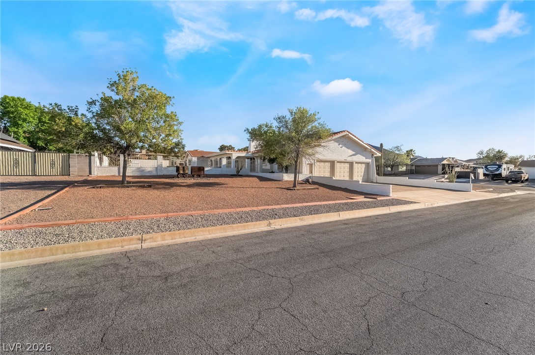 429 Crestway Road Henderson, NV 89015 - Photo 7 of 56 A classic facade with a paved driveway and low-maintenance landscaping creates inviting curb appeal.