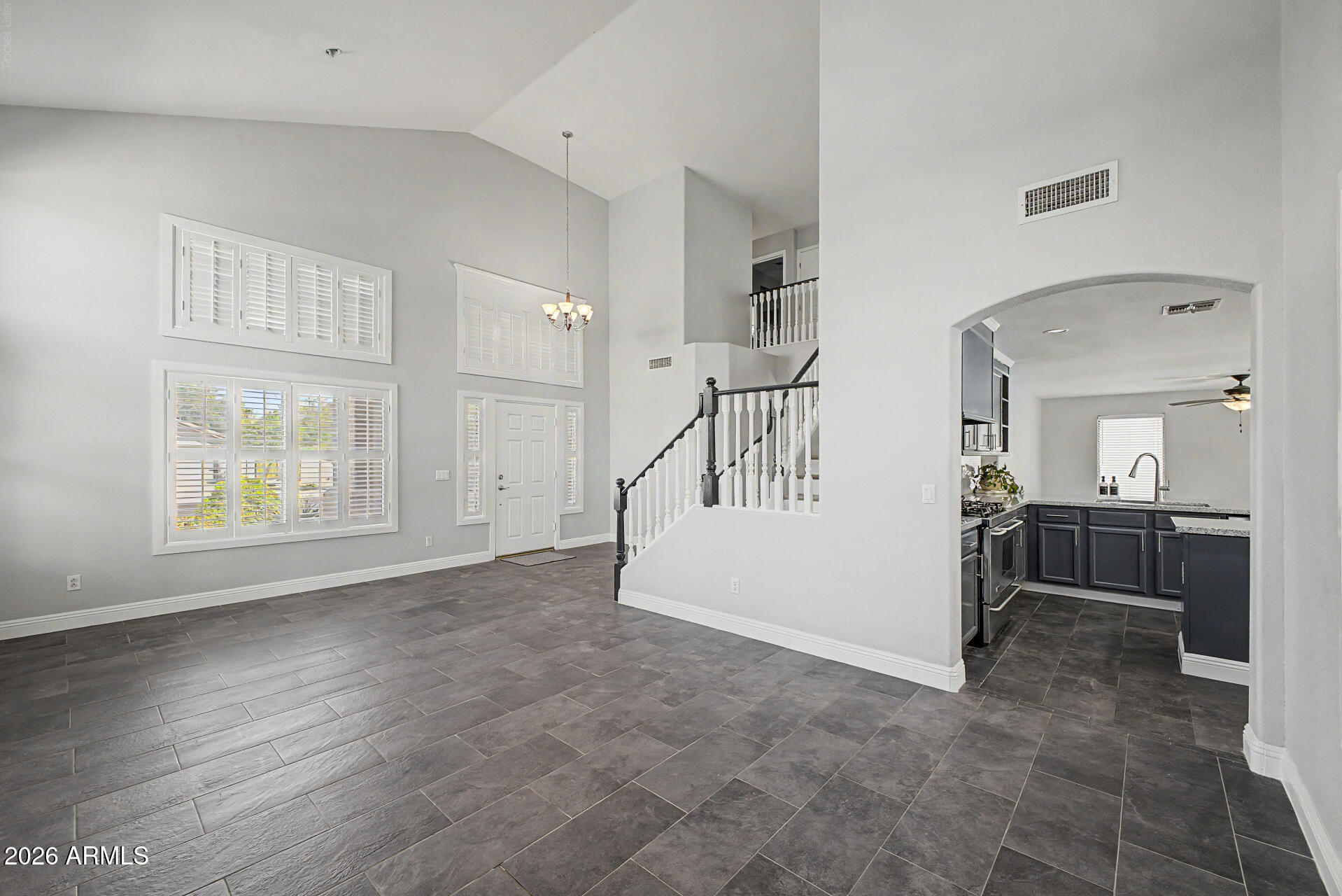 1098 South Roca Street Gilbert, AZ 85296 - Photo 10 of 57 FormalDineLivngRm2Strs_NW2SE