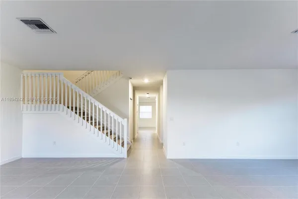 a view of an entryway with staircase