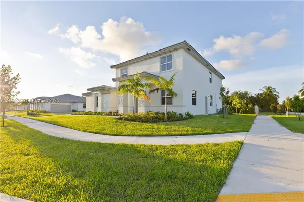 a view of a house with a swimming pool