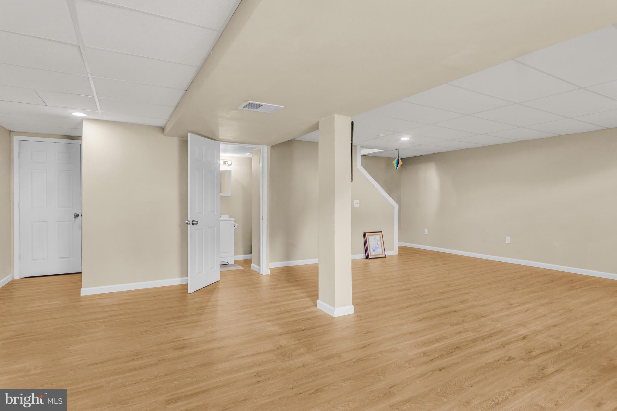 25 Springbrook Drive Palmyra, PA 17078 - Photo 32 of 34 a view of an empty room with wooden floor