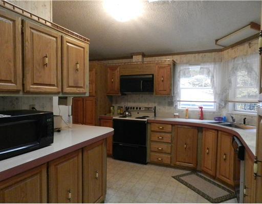 402 Elm Street Limerick, ME 04048 - Photo 3 of 16 Kitchen. Kitchen is a semi-circle...