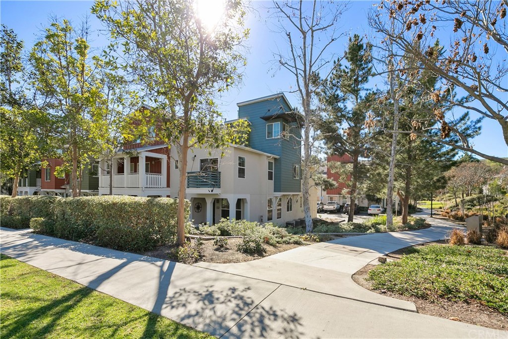 61 Platinum Circle Ladera Ranch, CA 92694 - Photo 1 of 1 a front view of a building with trees