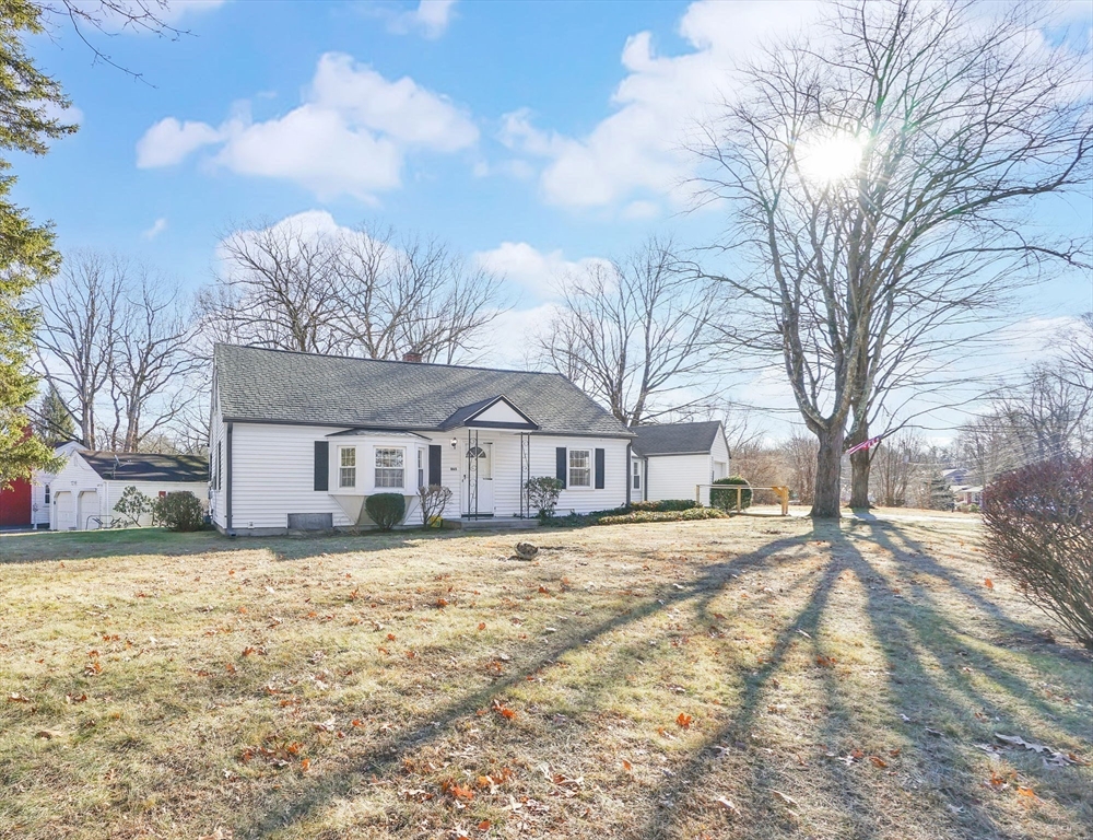 865 South Branch Parkway Springfield, MA 01118 - Photo 31 of 35 a large house with a large tree in front of it