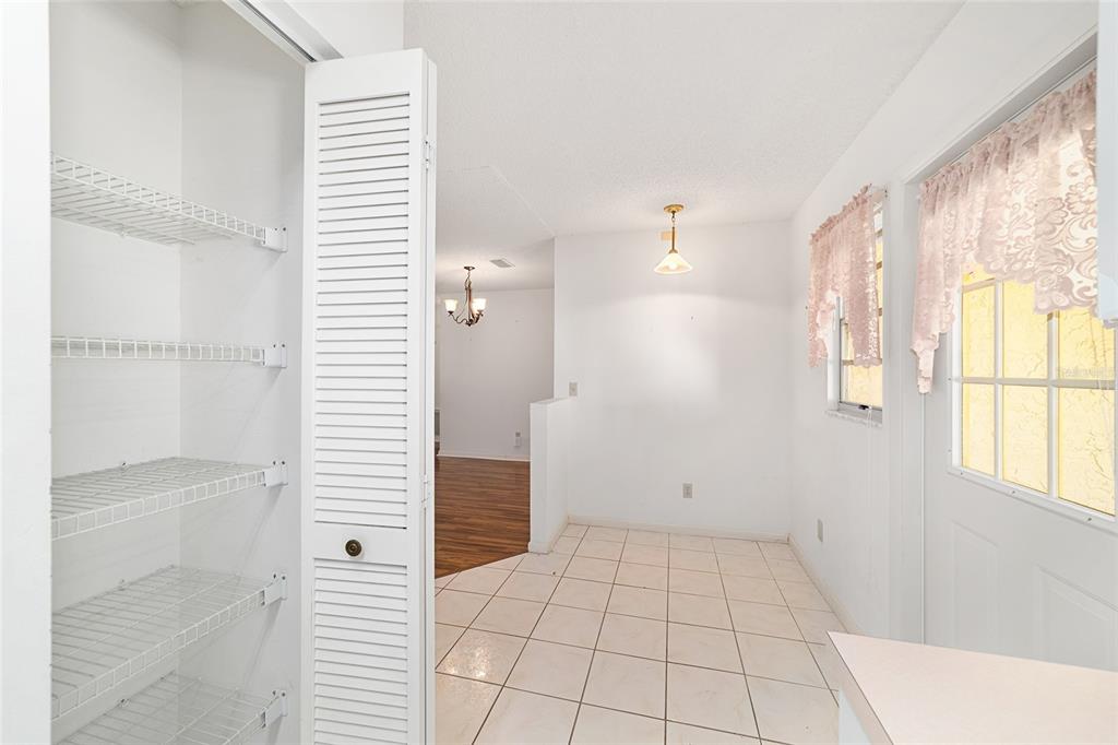 9460 Southwest 84th Terrace, Unit E Ocala, FL 34481 - Photo 11 of 21 a view of an empty room