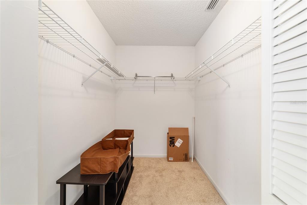 9460 Southwest 84th Terrace, Unit E Ocala, FL 34481 - Photo 15 of 21 a view of a hallway with seating area