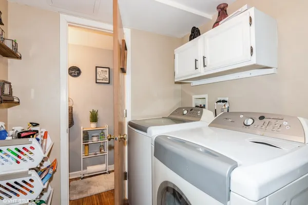 a utility room with dryer and washer