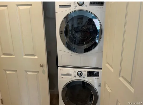 a view of washer and dryer in a utility room