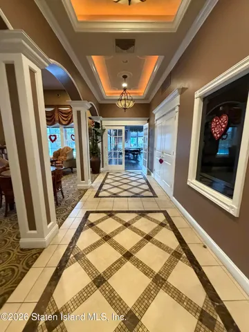 a view of a hallway with a couch