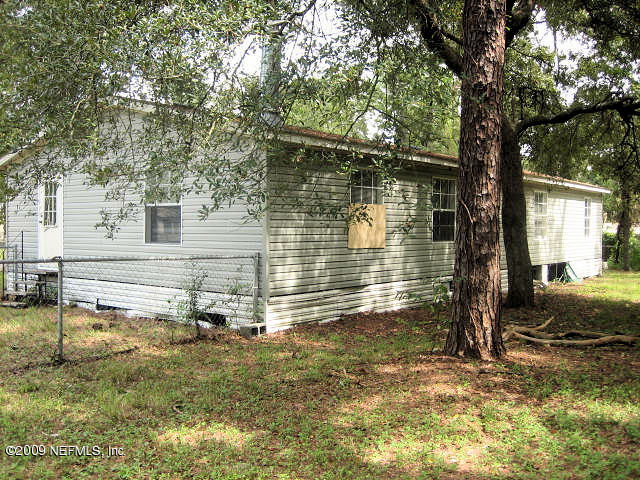 2252 Longreene Road North Jacksonville, FL 32218 - Photo 4 of 14 Rear View of Home