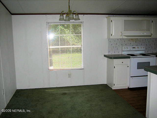2252 Longreene Road North Jacksonville, FL 32218 - Photo 6 of 14 Dining Room Convenient to Kitchen