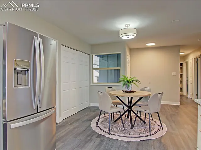 a view of a dining room with furniture
