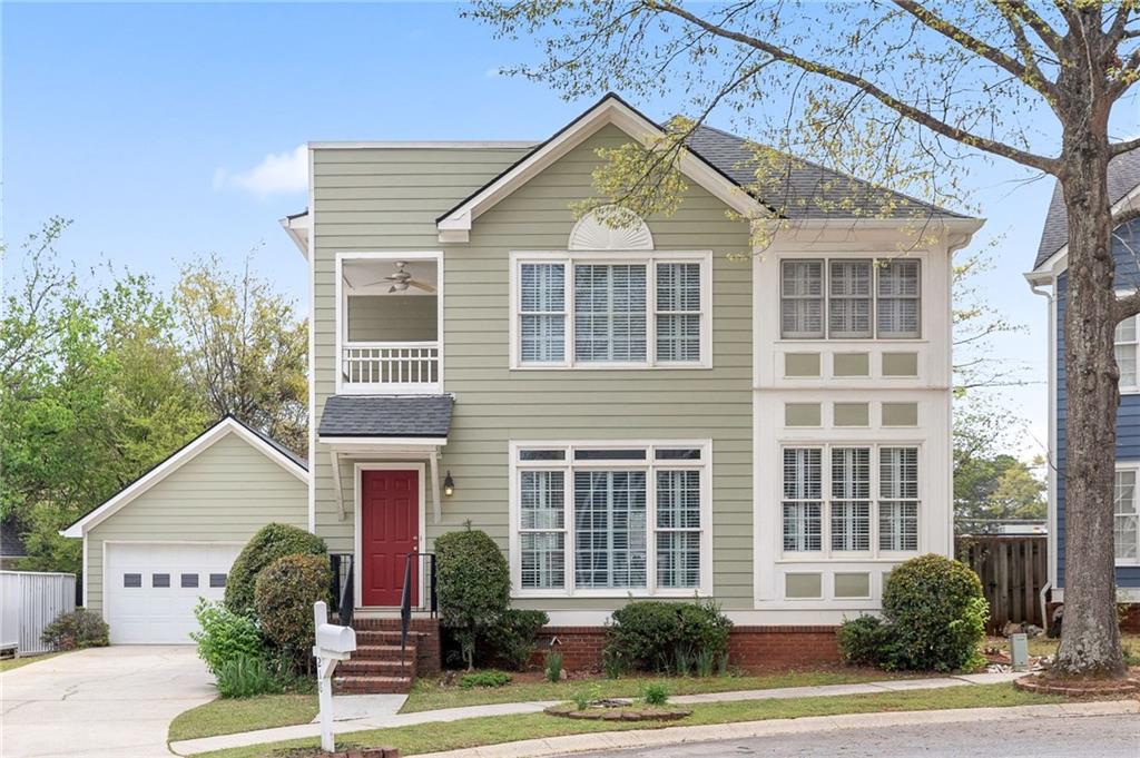 218 Ridley Lane Decatur, GA 30030 - Photo 1 of 1 a front view of a house with garden