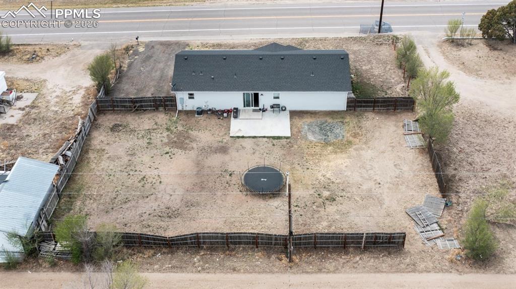 736 Indiana Avenue Limon, CO 80828 - Photo 35 of 37 a aerial view of a house with a yard