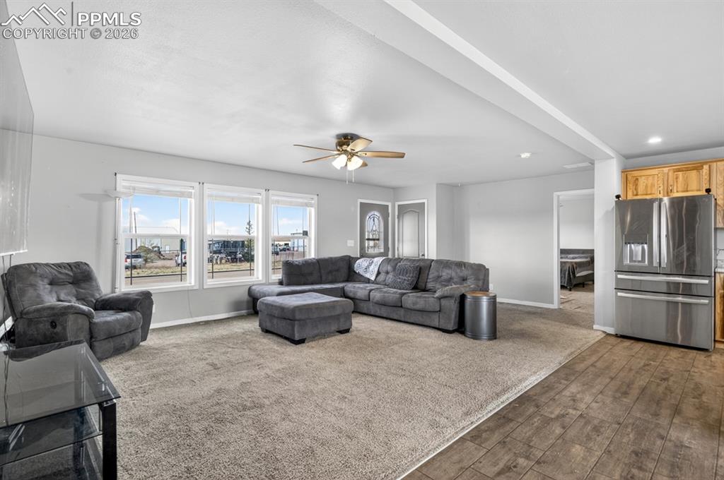 736 Indiana Avenue Limon, CO 80828 - Photo 6 of 37 a living room with furniture and a large window