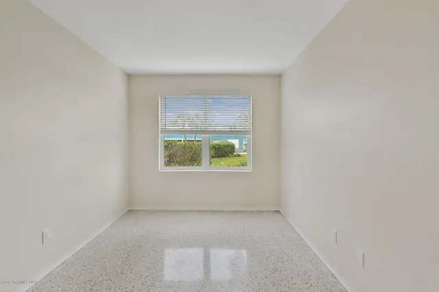 a bathroom with a sink toilet and mirror