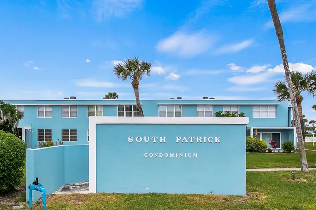 a view of a house with a swimming pool