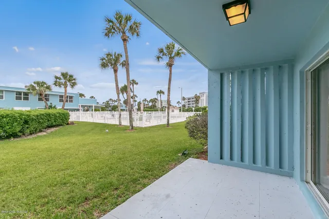 a view of a house with a garden