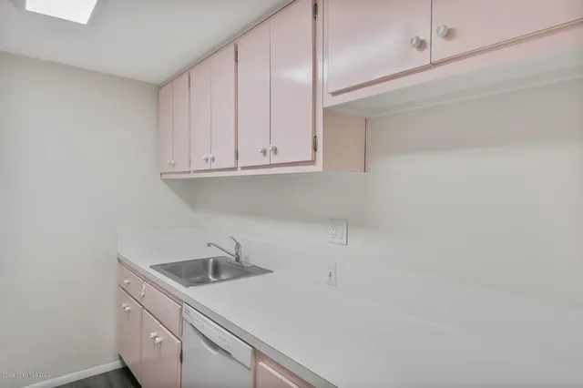 a kitchen with a stove and a microwave