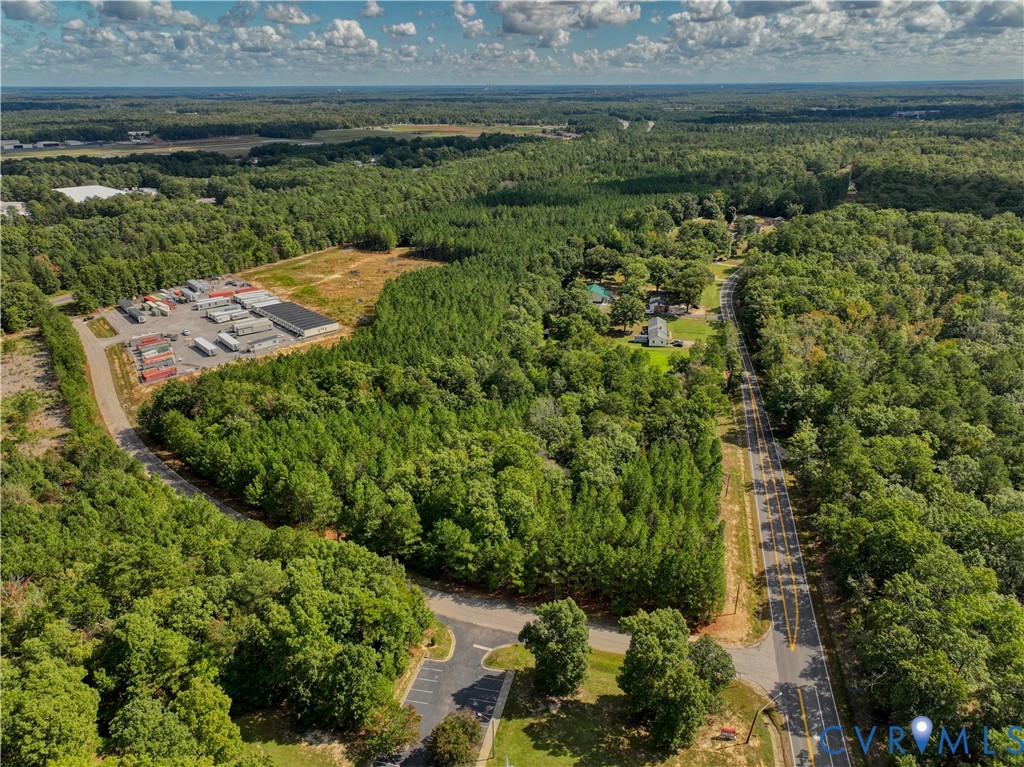 8101 Double Creek Court Chesterfield, VA 23832 - Photo 1 of 13 a view of a garden with a building