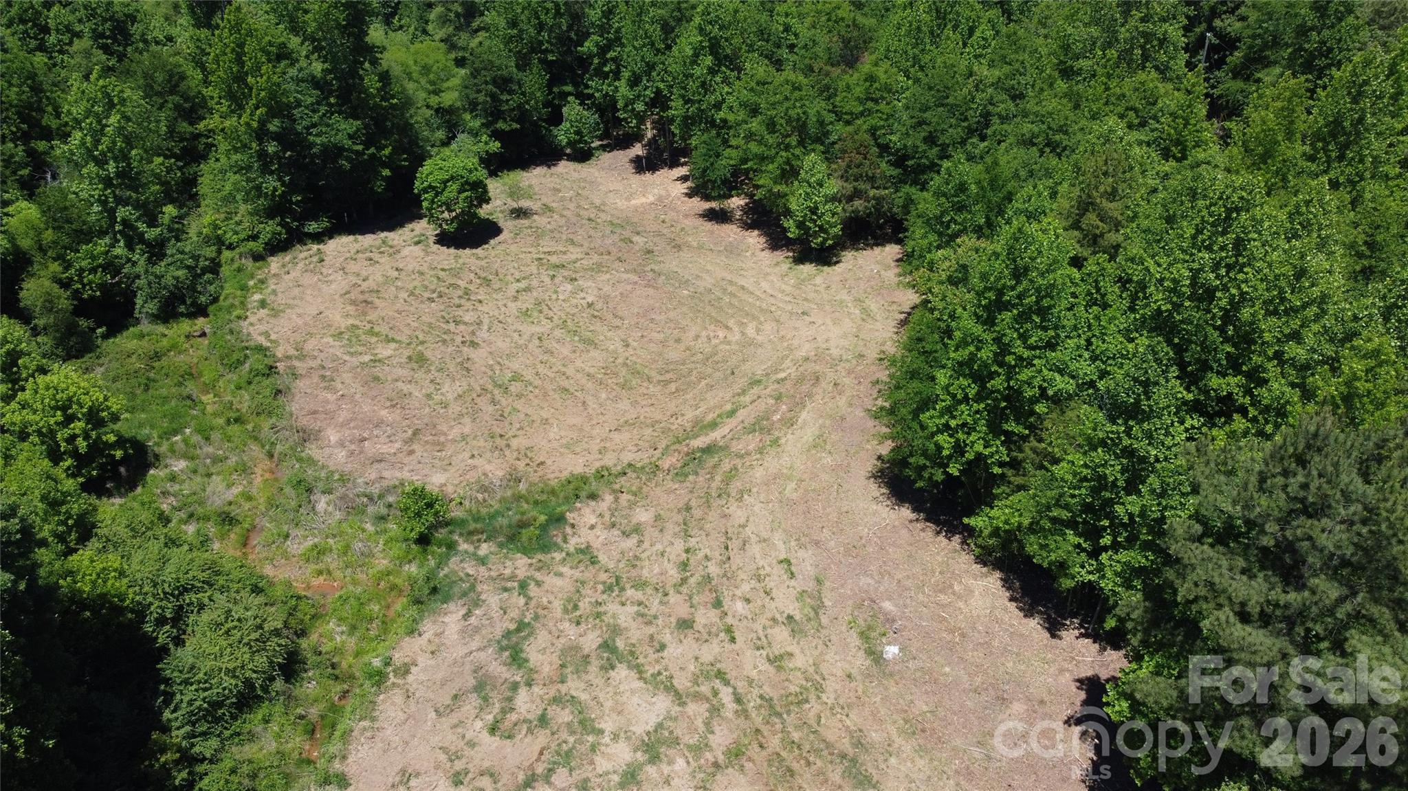 480 Brown Road Spartanburg, SC 29302 - Photo 11 of 47 a view of a yard with plants and trees