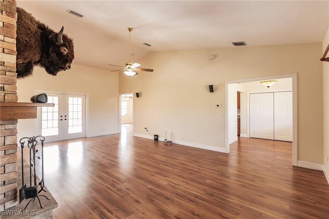 27425 Jones Loop Road Punta Gorda, FL 33982 - Photo 11 of 46 wooden floor in an empty room