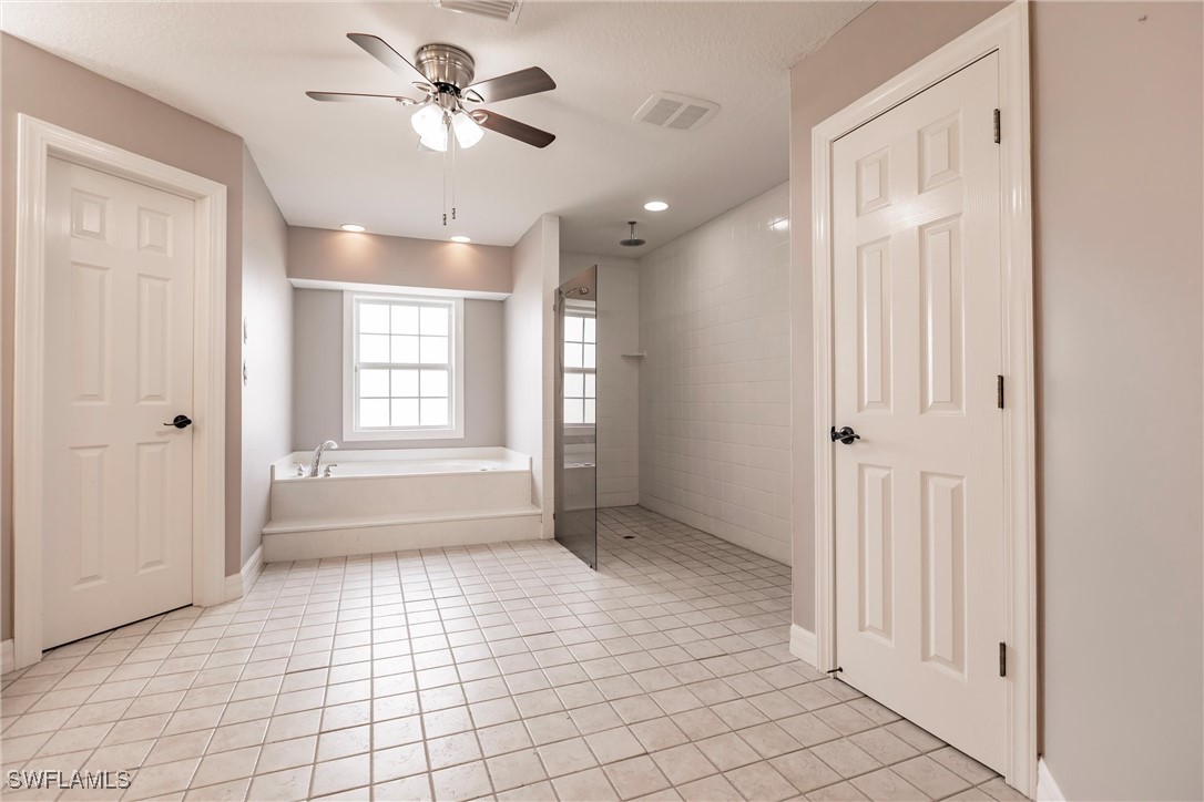 27425 Jones Loop Road Punta Gorda, FL 33982 - Photo 30 of 46 a view of an empty room with a window