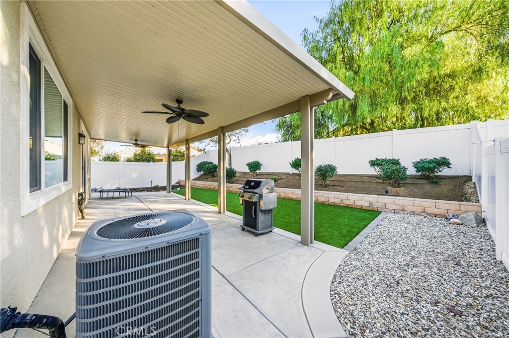 26535 Rim Creek Path Menifee, CA 92584 - Photo 36 of 50 a view of a backyard with sitting area