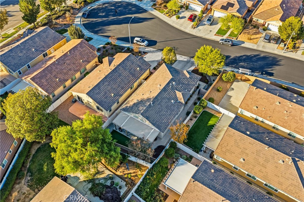 26535 Rim Creek Path Menifee, CA 92584 - Photo 44 of 50 an aerial view of a house with a yard and garden