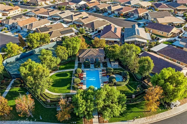 an aerial view of a house with a garden
