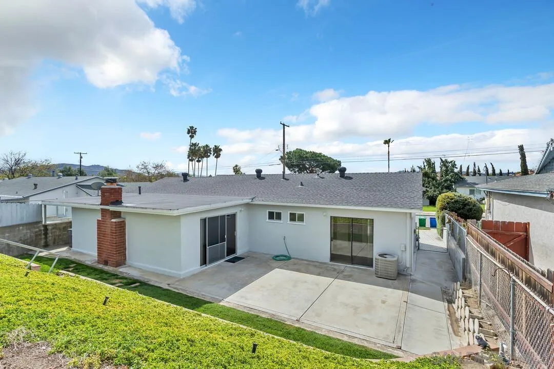 9540 Abbeyfield Road Santee, CA 92071 - Photo 31 of 35 a aerial view of a house with a yard and potted plants