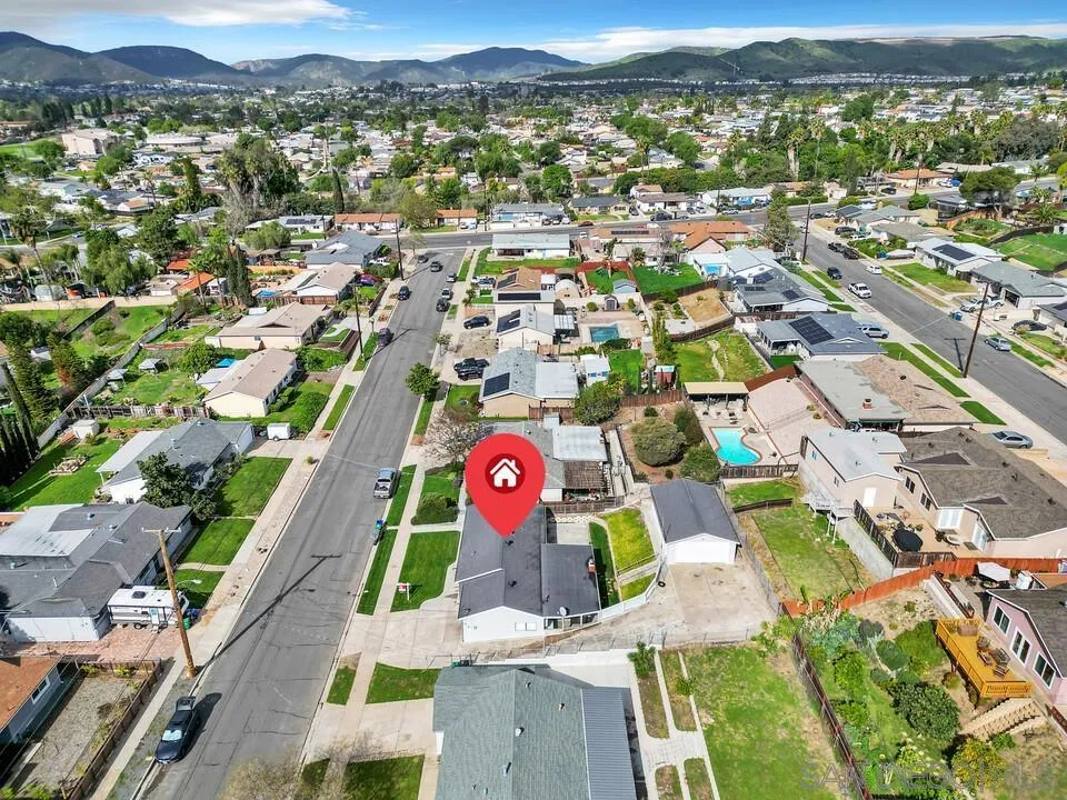 9540 Abbeyfield Road Santee, CA 92071 - Photo 34 of 35 an aerial view of residential houses with outdoor space and seating