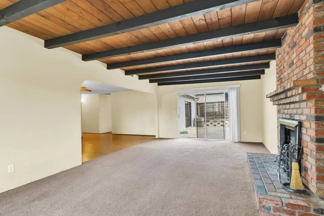 9540 Abbeyfield Road Santee, CA 92071 - Photo 6 of 35 a view of an empty room with a fireplace