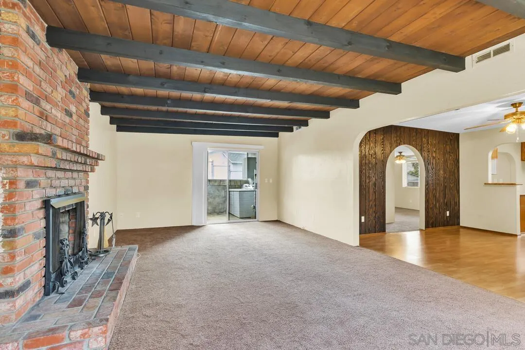 9540 Abbeyfield Road Santee, CA 92071 - Photo 7 of 35 a view of a livingroom with a fireplace