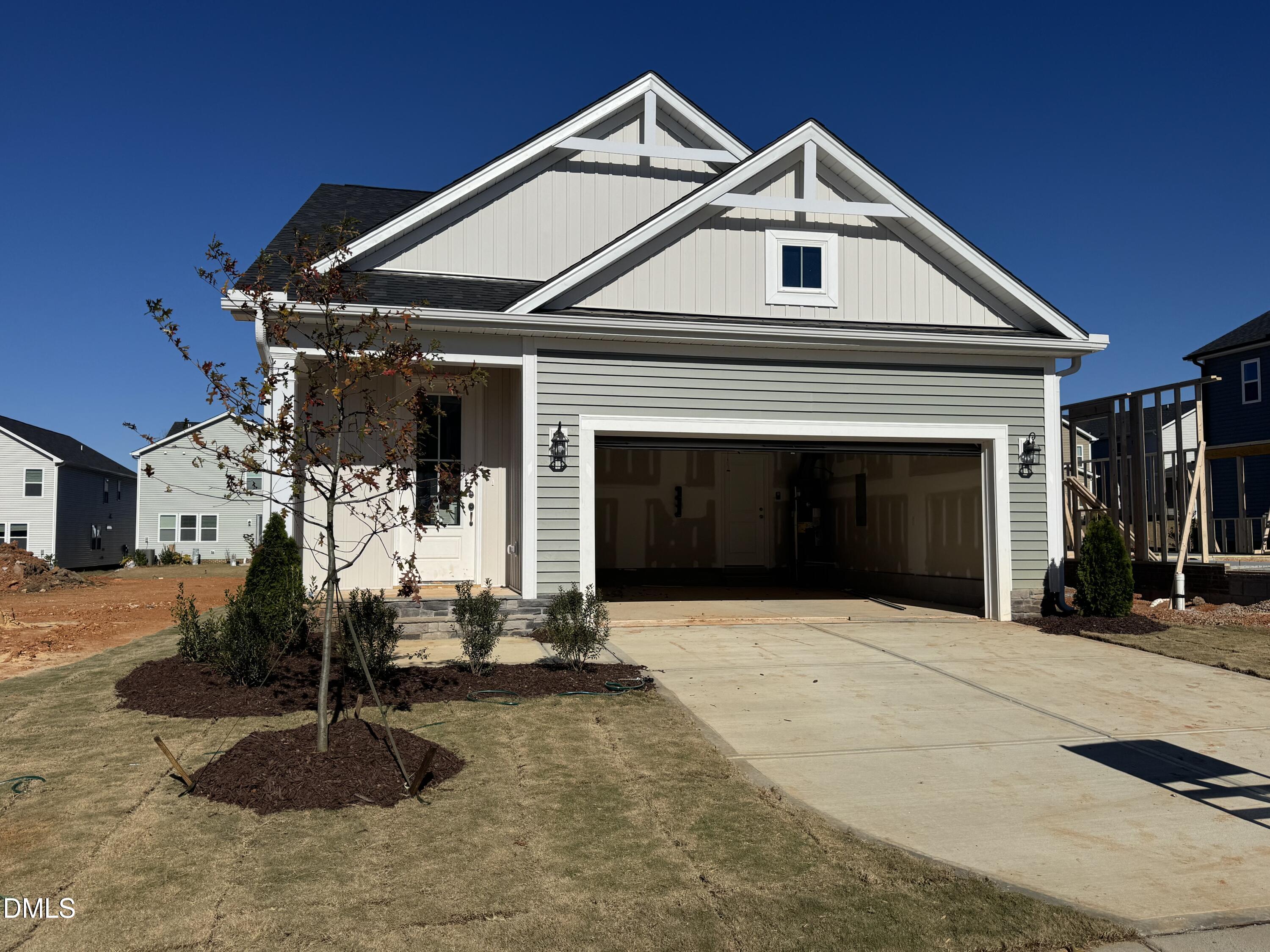 128 Vulcan Street Garner, NC 27529 - Photo 1 of 28 a front view of a house with a yard