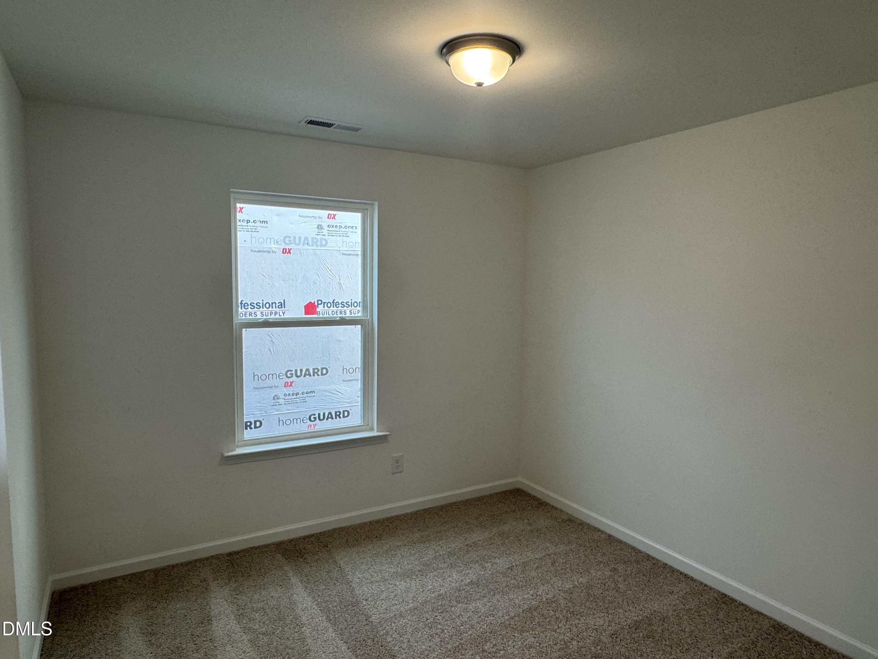 128 Vulcan Street Garner, NC 27529 - Photo 21 of 28 an empty room with a window