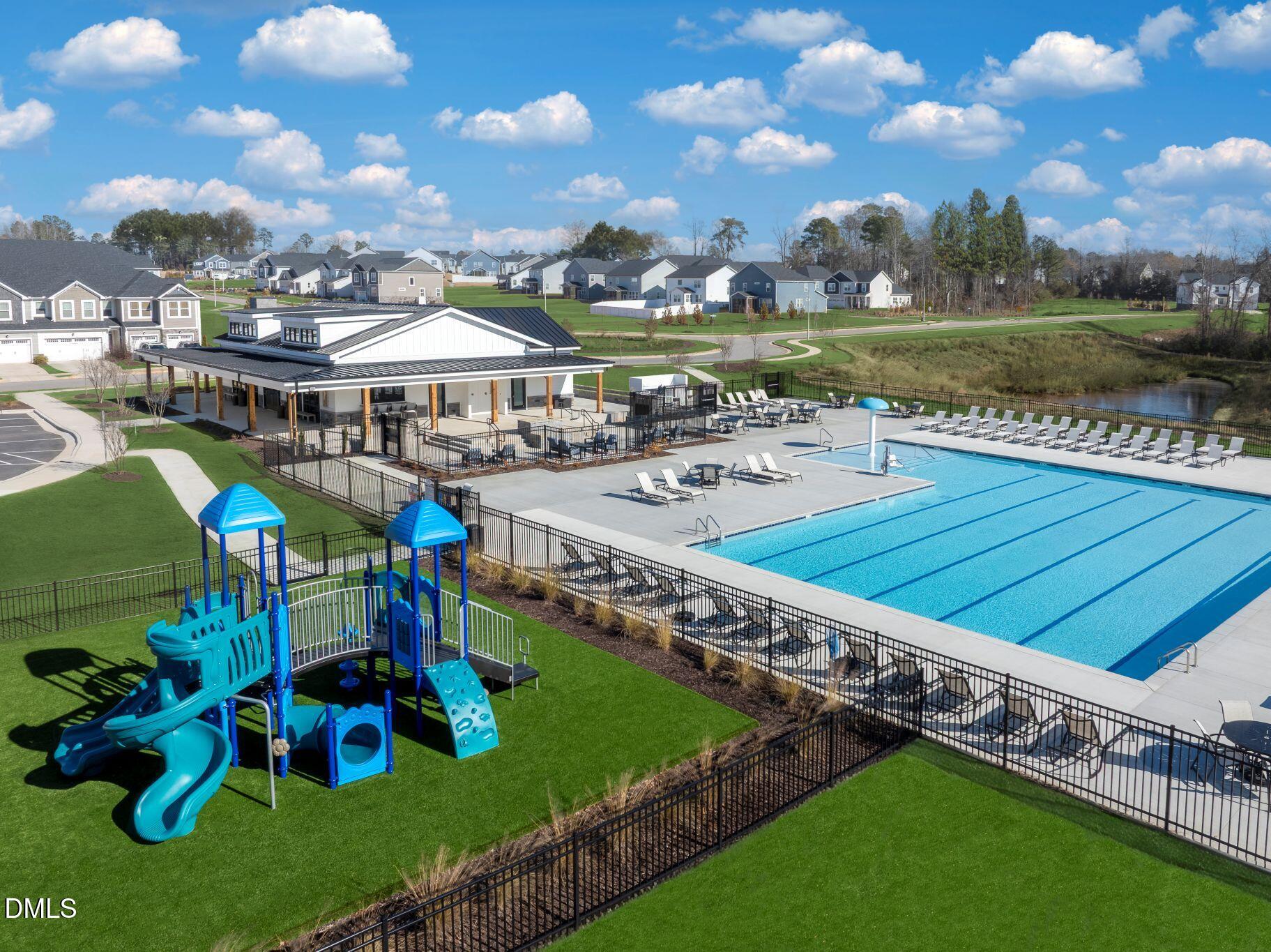 128 Vulcan Street Garner, NC 27529 - Photo 27 of 28 a view of a swimming pool and outdoor seating