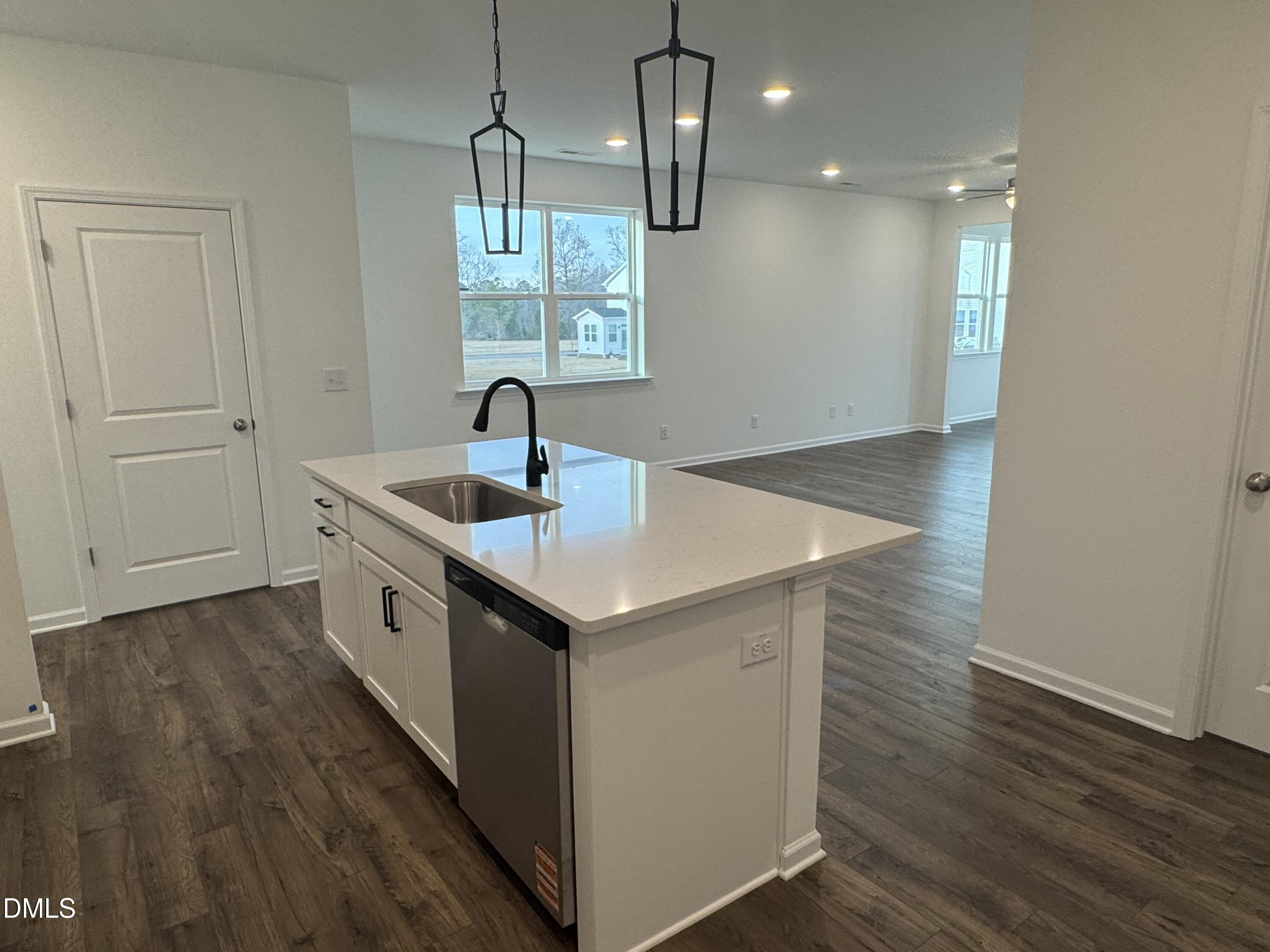 128 Vulcan Street Garner, NC 27529 - Photo 10 of 28 a kitchen that has a lot of cabinets in it