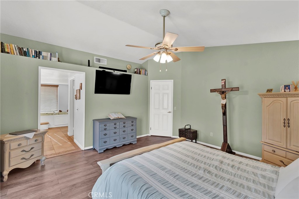 3350 May Court Riverside, CA 92503 - Photo 21 of 55 a bedroom with a bed a flat screen tv and dresser