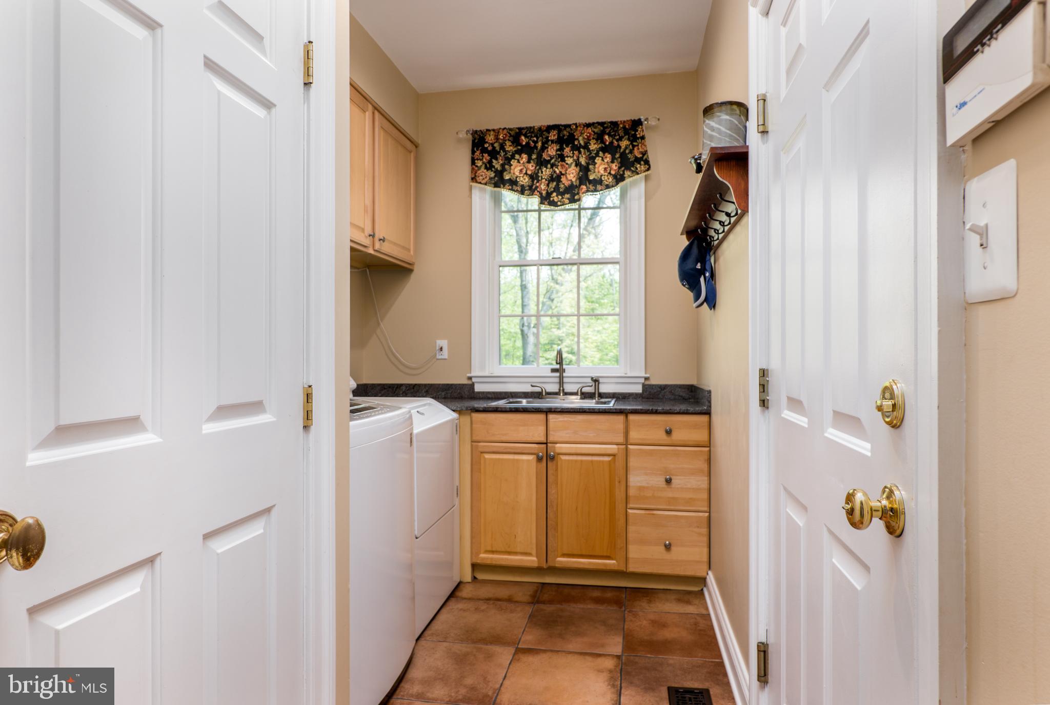 1500 Magers Landing Road Monkton, MD 21111 - Photo 9 of 37 Laundry off garage with sink and laundry chute
