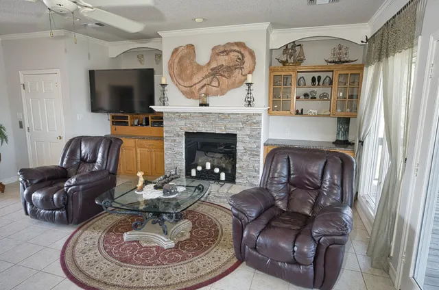 a bed room with a bed mirror and a window