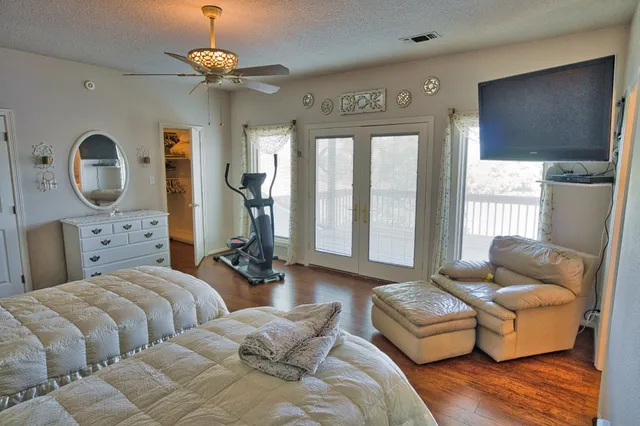 a view of a lake in middle of forest