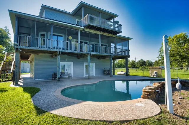 a view of a porch with wooden floor