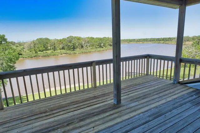 a house view with a lake view