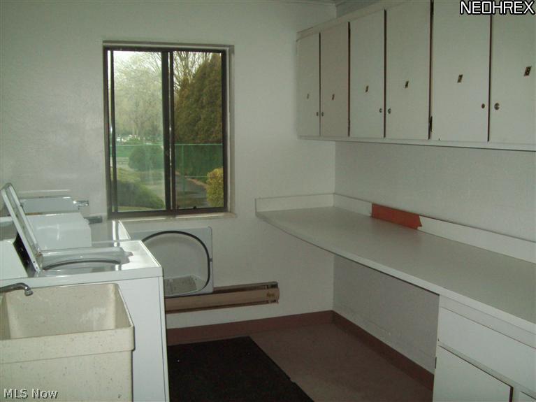 9956 Johnnycake Ridge Road, Unit L3 Painesville, OH 44077 - Photo 13 of 15 The public laundry room is on the second floor. Pay per use. Each unit has cabinet space to keep laundry supplies.