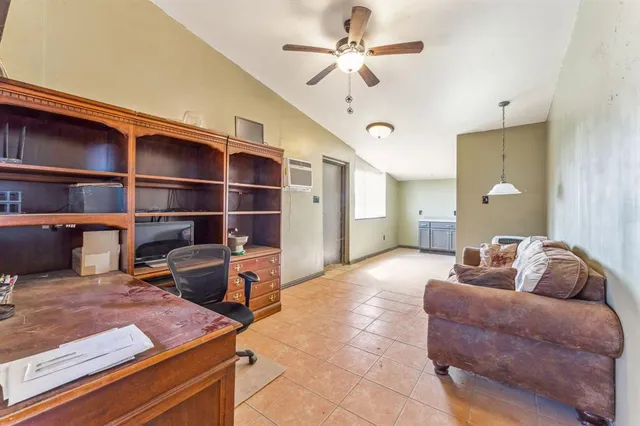 a view of an empty room with sliding glass door