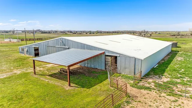 a view of swimming pool with a lounge chair